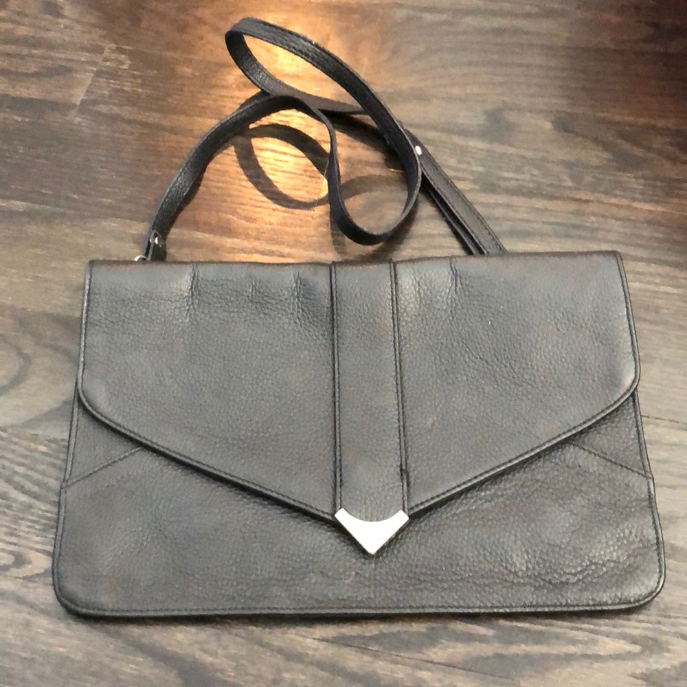 Black leather clutch/crossbody bag.